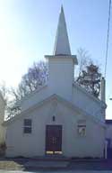 Mount Pisgah AME Church, a traditional church building, white with tall steeple